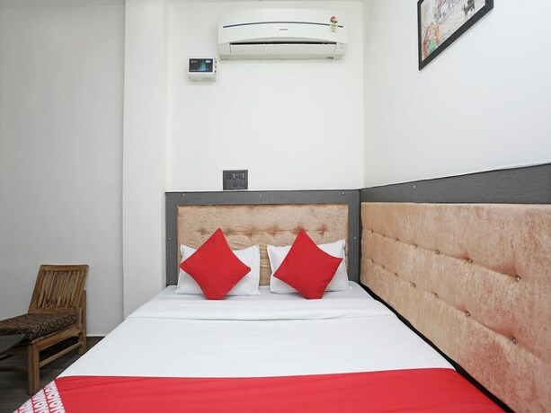 Imagen de la habitación del Hotel Oyo 14468 Divine Ganges. Foto 5