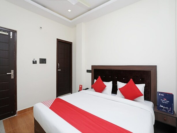 Imagen de la habitación del Hotel Oyo 14468 Divine Ganges. Foto 9