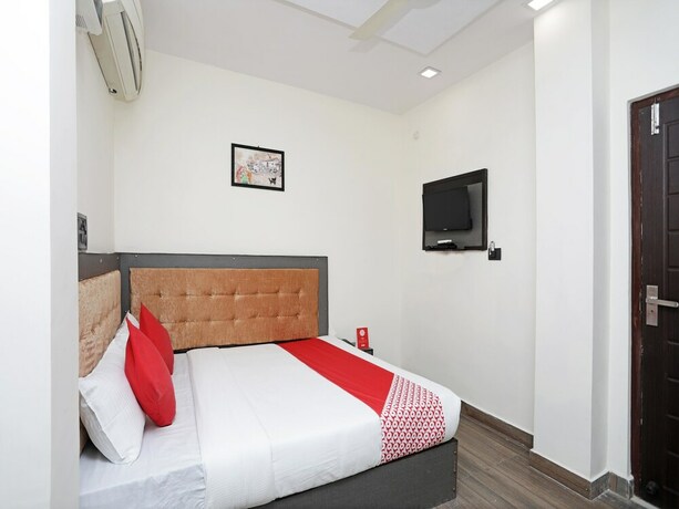 Imagen de la habitación del Hotel Oyo 14468 Divine Ganges. Foto 10