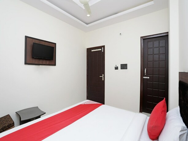 Imagen de la habitación del Hotel Oyo 14468 Divine Ganges. Foto 11