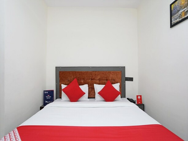 Imagen de la habitación del Hotel Oyo 14468 Divine Ganges. Foto 13