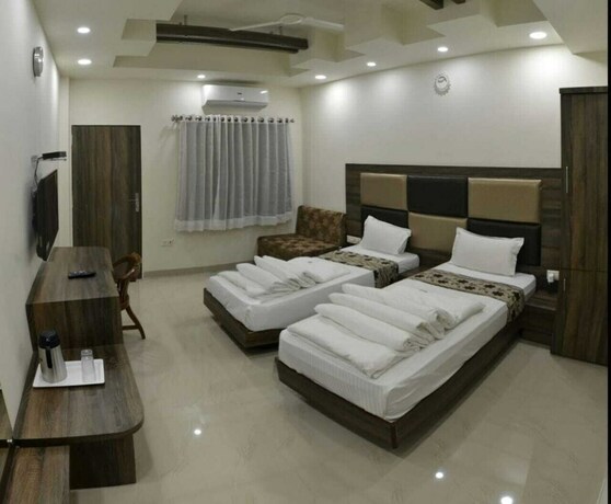 Imagen de la habitación del Hotel Oyo 14593 Shree Vatika Smart Rooms. Foto 11