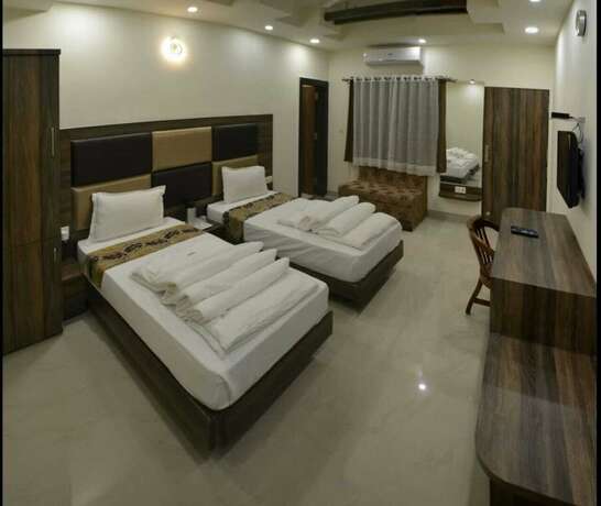 Imagen de la habitación del Hotel Oyo 14593 Shree Vatika Smart Rooms. Foto 12