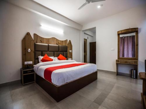 Imagen de la habitación del Hotel Oyo 15074 Neha Regency. Foto 9