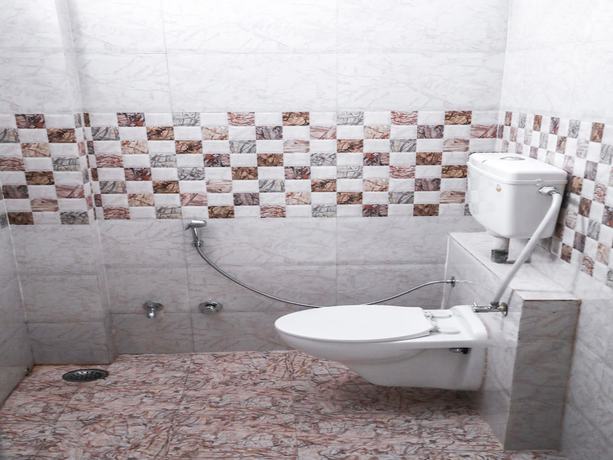 Imagen de la habitación del Hotel Oyo 15259 Smart City. Foto 18