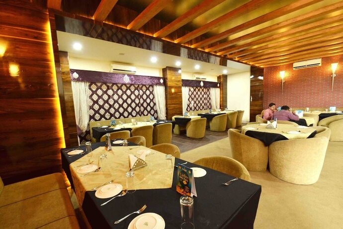 Imagen del bar/restaurante del Hotel Oyo 1546 The Sensation. Foto 3