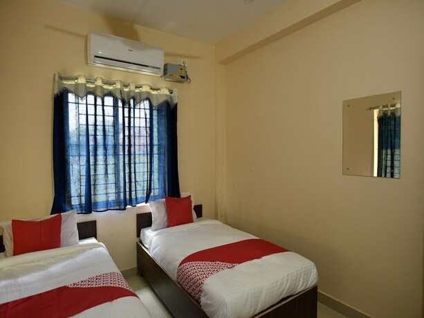 Imagen de la habitación del Hotel Oyo 15474 The Village Inn. Foto 7