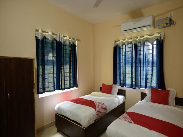 Imagen de la habitación del Hotel Oyo 15474 The Village Inn. Foto 11