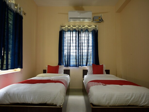 Imagen de la habitación del Hotel Oyo 15474 The Village Inn. Foto 17