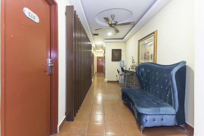 Imagen de la habitación del Hotel Oyo 157 Norbu. Foto 8