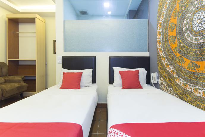 Imagen de la habitación del Hotel Oyo 157 Norbu. Foto 12