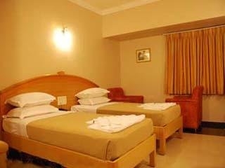 Imagen de la habitación del Hotel Oyo 15781 Shree Adiga Residency. Foto 3