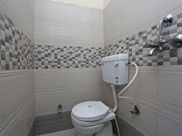 Imagen de la habitación del Hotel Oyo 15994 Bullet Inn and Lounge. Foto 4
