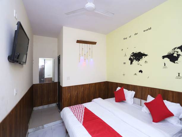 Imagen de la habitación del Hotel Oyo 15994 Bullet Inn and Lounge. Foto 8