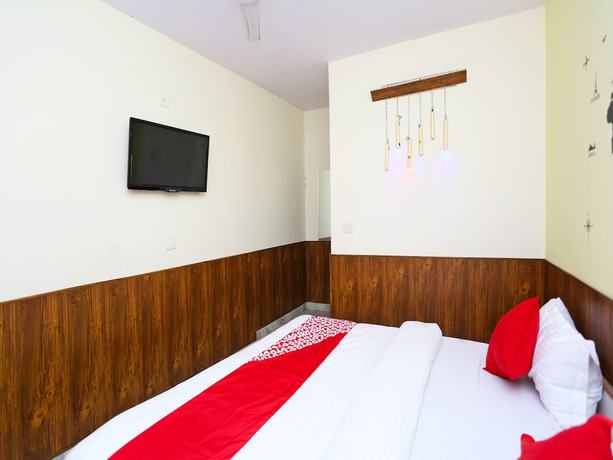 Imagen de la habitación del Hotel Oyo 15994 Bullet Inn and Lounge. Foto 9