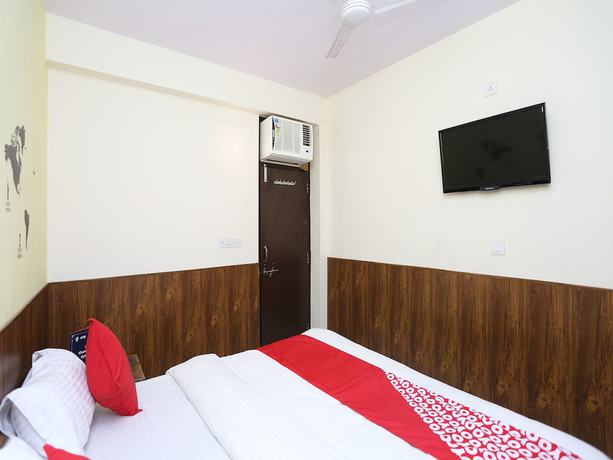 Imagen de la habitación del Hotel Oyo 15994 Bullet Inn and Lounge. Foto 13