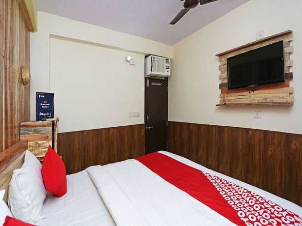 Imagen de la habitación del Hotel Oyo 15994 Bullet Inn and Lounge. Foto 14