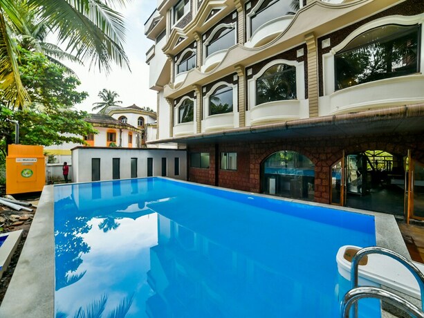 Imagen de la piscina del Hotel Oyo 16096 Flagship Purushottam Mapusa. Foto 20