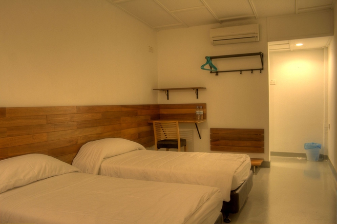 Imagen de la habitación del Hotel Oyo 161 Lodge Paradize. Foto 5