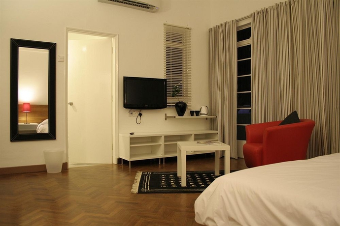 Imagen de la habitación del Hotel Oyo 161 Lodge Paradize. Foto 8