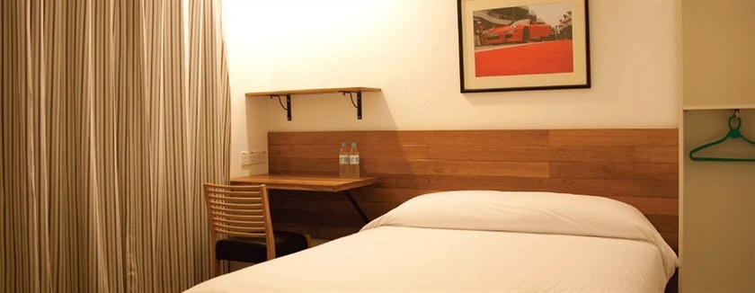 Imagen de la habitación del Hotel Oyo 161 Lodge Paradize. Foto 11