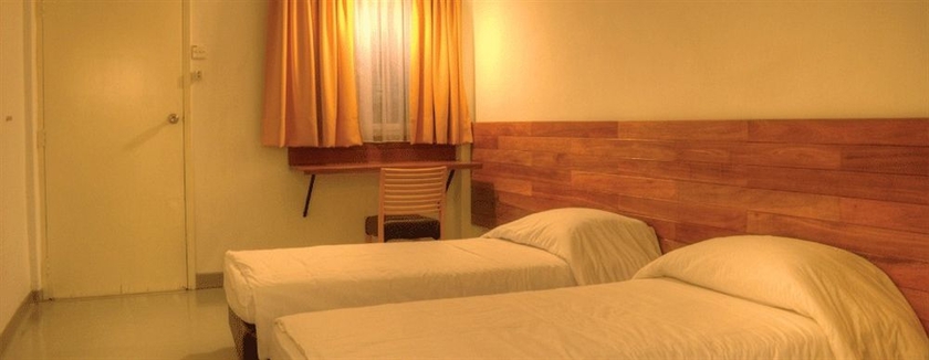 Imagen de la habitación del Hotel Oyo 161 Lodge Paradize. Foto 12
