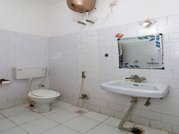 Imagen de la habitación del Hotel Oyo 16112 Uruvela International. Foto 15