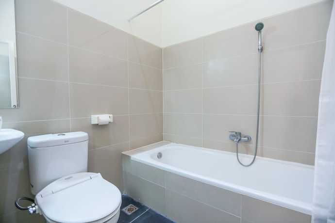 Imagen de la habitación del Hotel Oyo 170 Koen View. Foto 17