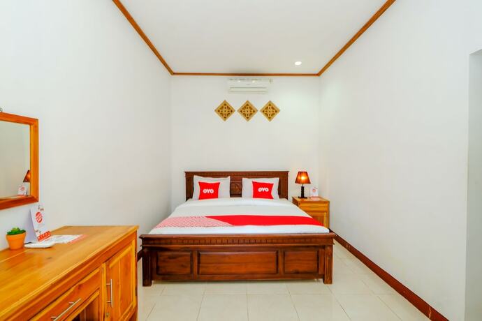 Imagen de la habitación del Hotel Oyo 1793 Kuta Circle Homestay. Foto 9