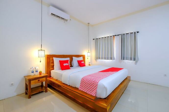 Imagen de la habitación del Hotel Oyo 1793 Kuta Circle Homestay. Foto 11