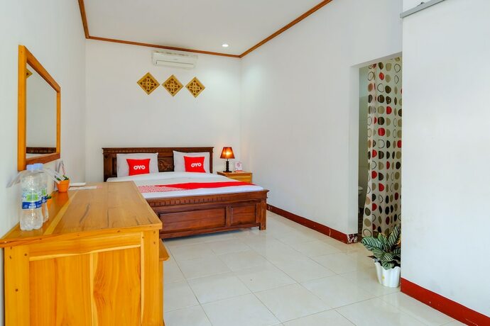 Imagen de la habitación del Hotel Oyo 1793 Kuta Circle Homestay. Foto 12
