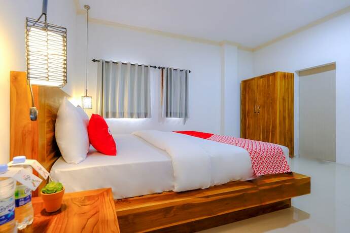 Imagen de la habitación del Hotel Oyo 1793 Kuta Circle Homestay. Foto 13