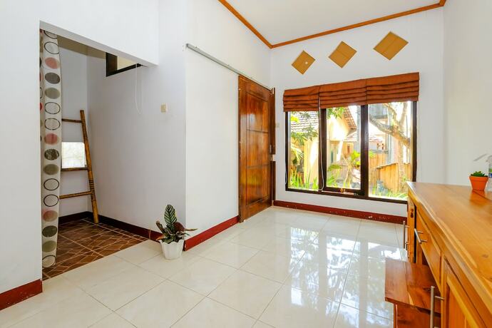 Imagen de la habitación del Hotel Oyo 1793 Kuta Circle Homestay. Foto 14
