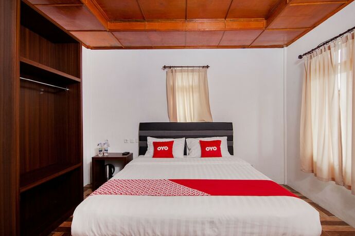 Imagen de la habitación del Hotel Oyo 1812 Dg Inn. Foto 14