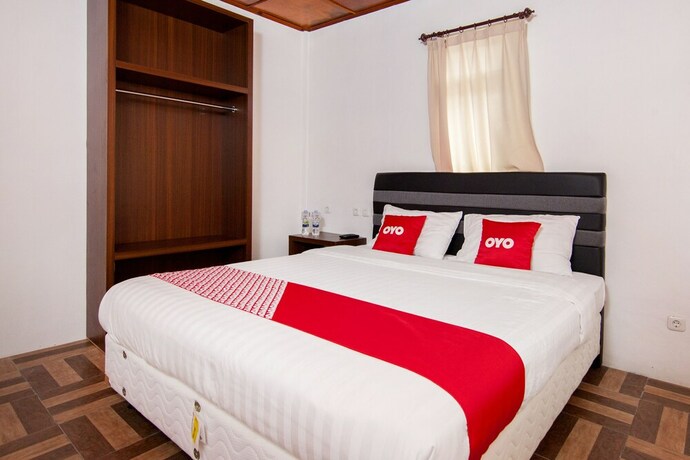 Imagen de la habitación del Hotel Oyo 1812 Dg Inn. Foto 15