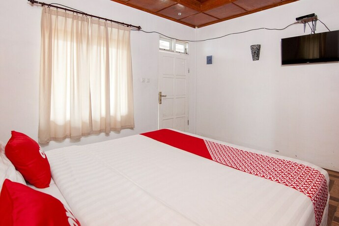 Imagen de la habitación del Hotel Oyo 1812 Dg Inn. Foto 17