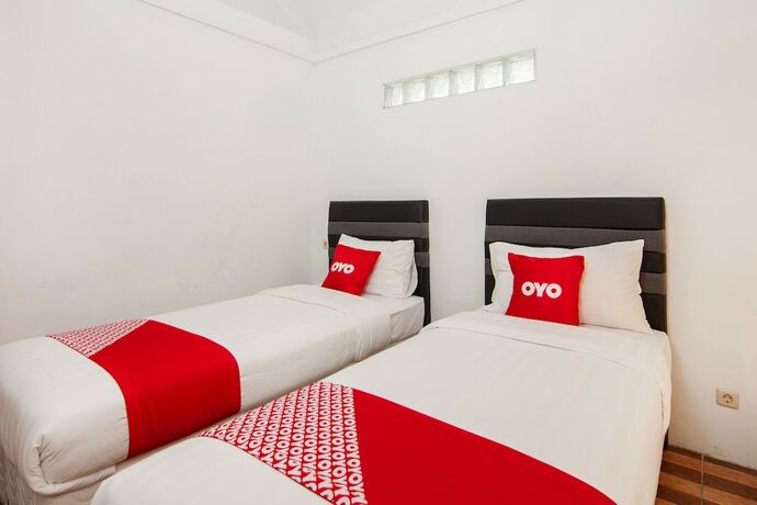 Imagen de la habitación del Hotel Oyo 1812 Dg Inn. Foto 18