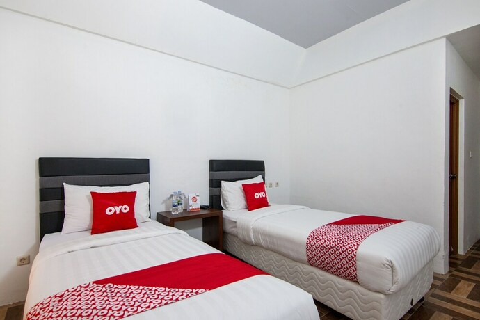 Imagen de la habitación del Hotel Oyo 1812 Dg Inn. Foto 21