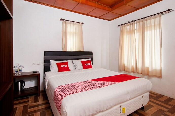 Imagen de la habitación del Hotel Oyo 1812 Dg Inn. Foto 23