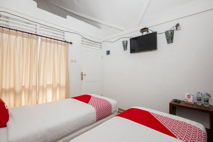Imagen de la habitación del Hotel Oyo 1812 Dg Inn. Foto 24