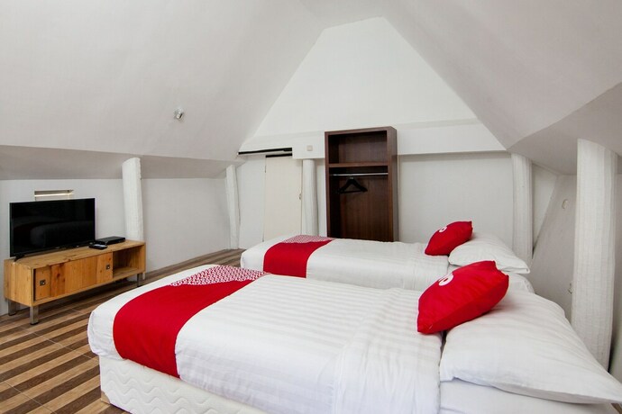 Imagen de la habitación del Hotel Oyo 1812 Dg Inn. Foto 25