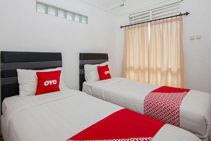 Imagen de la habitación del Hotel Oyo 1812 Dg Inn. Foto 29