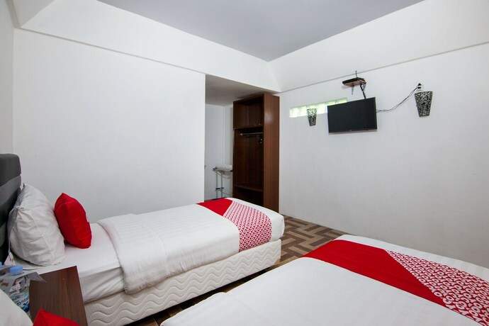 Imagen de la habitación del Hotel Oyo 1812 Dg Inn. Foto 31