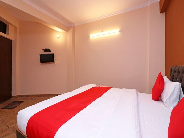 Imagen de la habitación del Hotel Oyo 19123 Sunshine Guest House. Foto 2