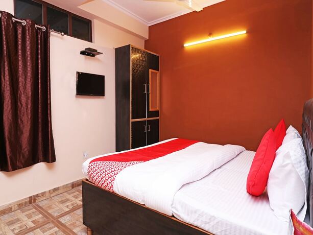 Imagen de la habitación del Hotel Oyo 19123 Sunshine Guest House. Foto 3