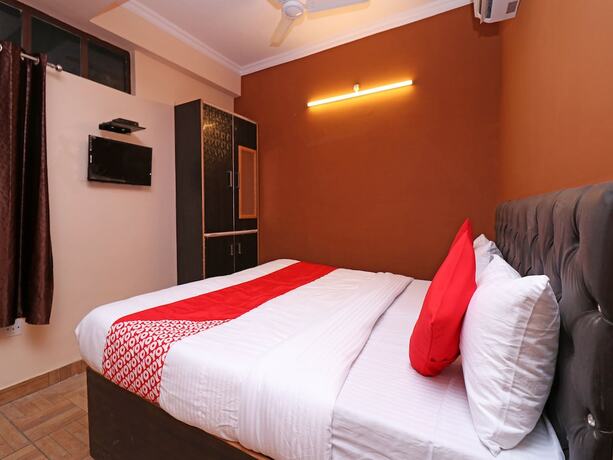 Imagen de la habitación del Hotel Oyo 19123 Sunshine Guest House. Foto 7