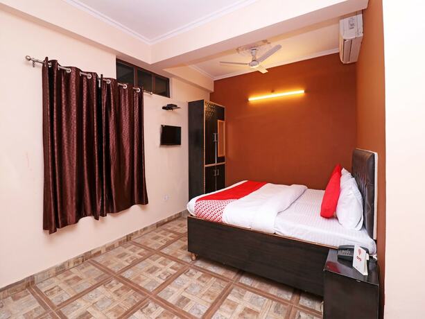 Imagen de la habitación del Hotel Oyo 19123 Sunshine Guest House. Foto 8