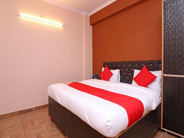 Imagen de la habitación del Hotel Oyo 19123 Sunshine Guest House. Foto 9