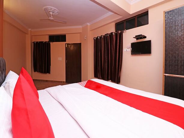 Imagen de la habitación del Hotel Oyo 19123 Sunshine Guest House. Foto 11