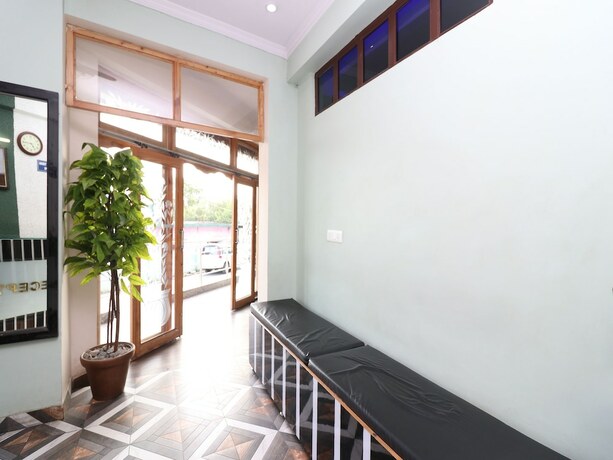 Imagen de los interiores del Hotel Oyo 19123 Sunshine Guest House. Foto 18